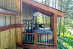 Alta Vista Cabin deck with hot tub and grill. 